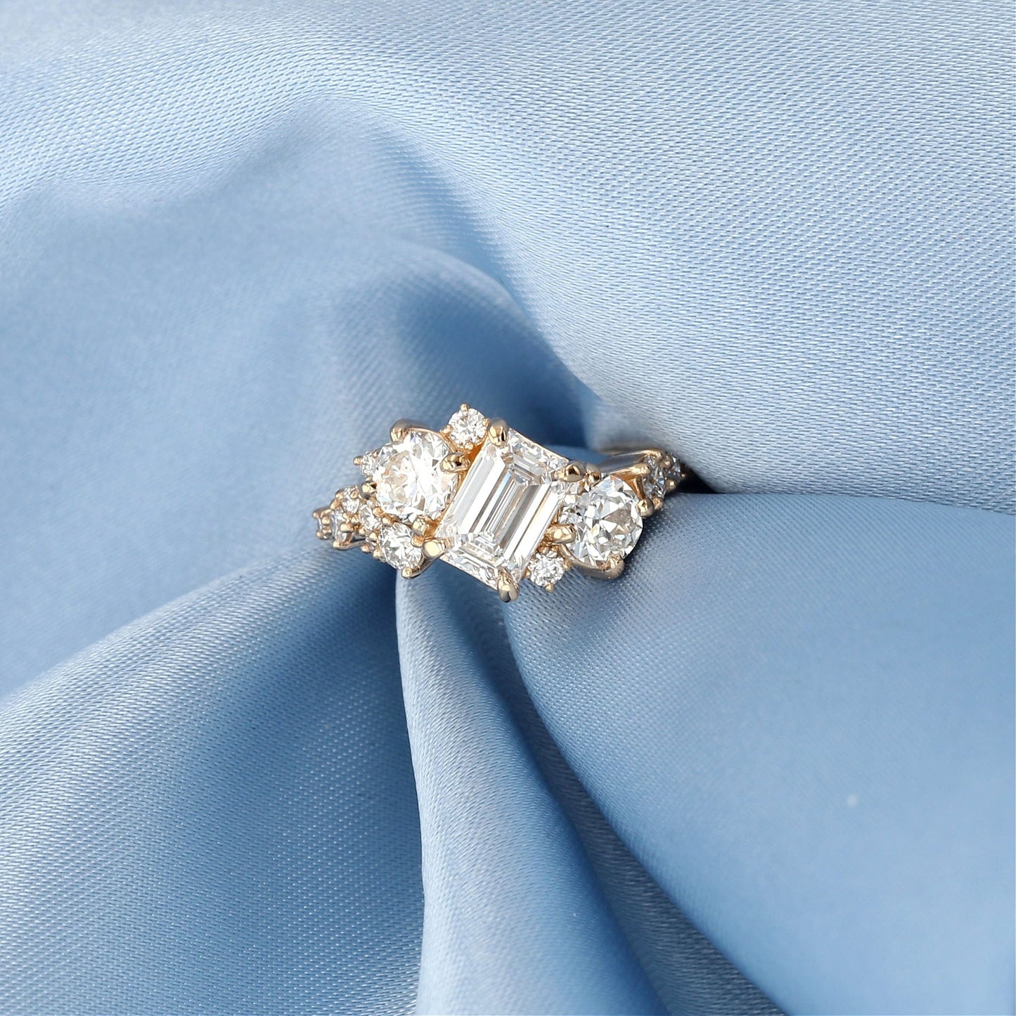 Emerald Cut & Round Diamond Cluster Engagement Ring