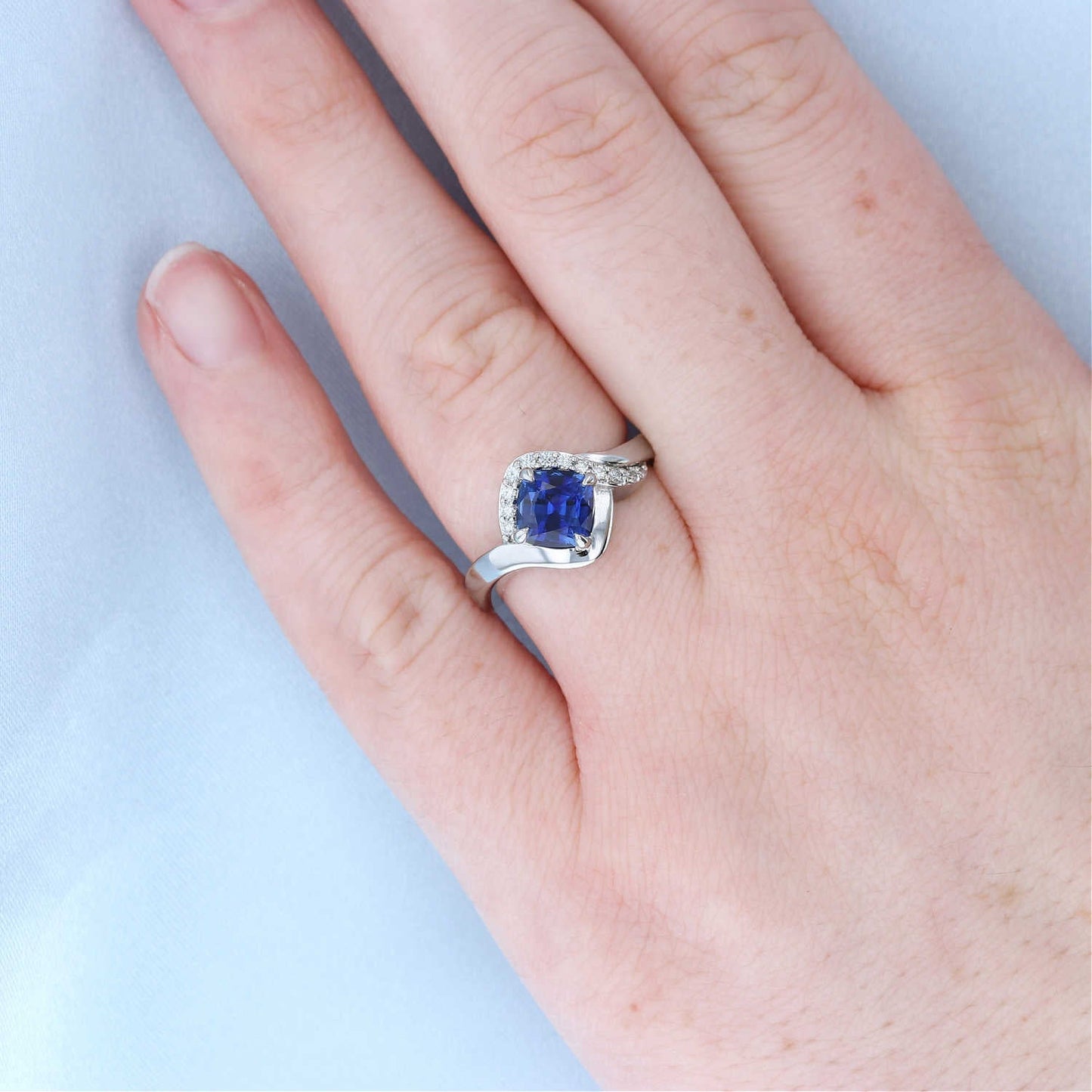 Cushion Blue Sapphire Bypass Diamond Halo Ring