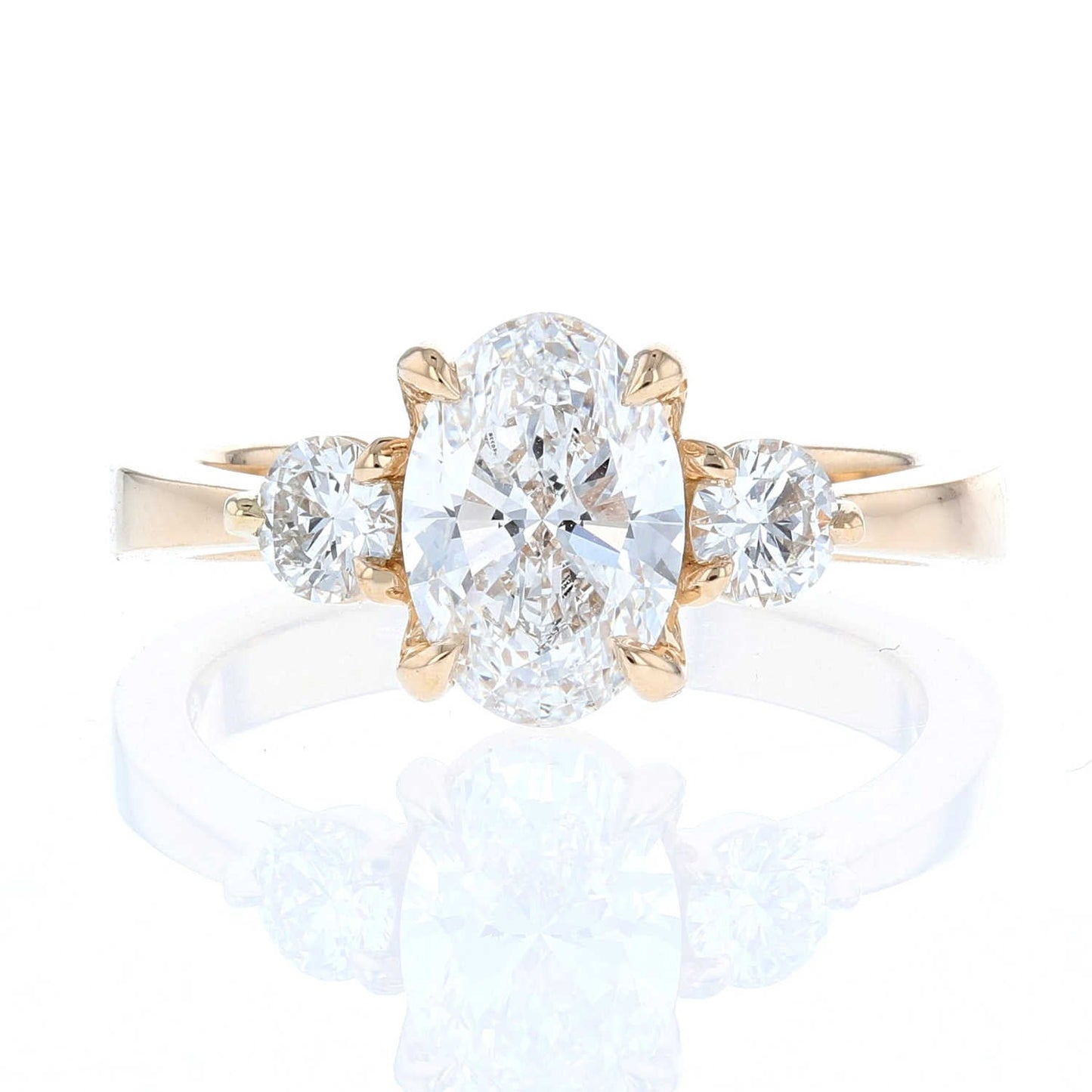 Yellow Gold Oval Diamond Three Stone Tapered Shank Ring