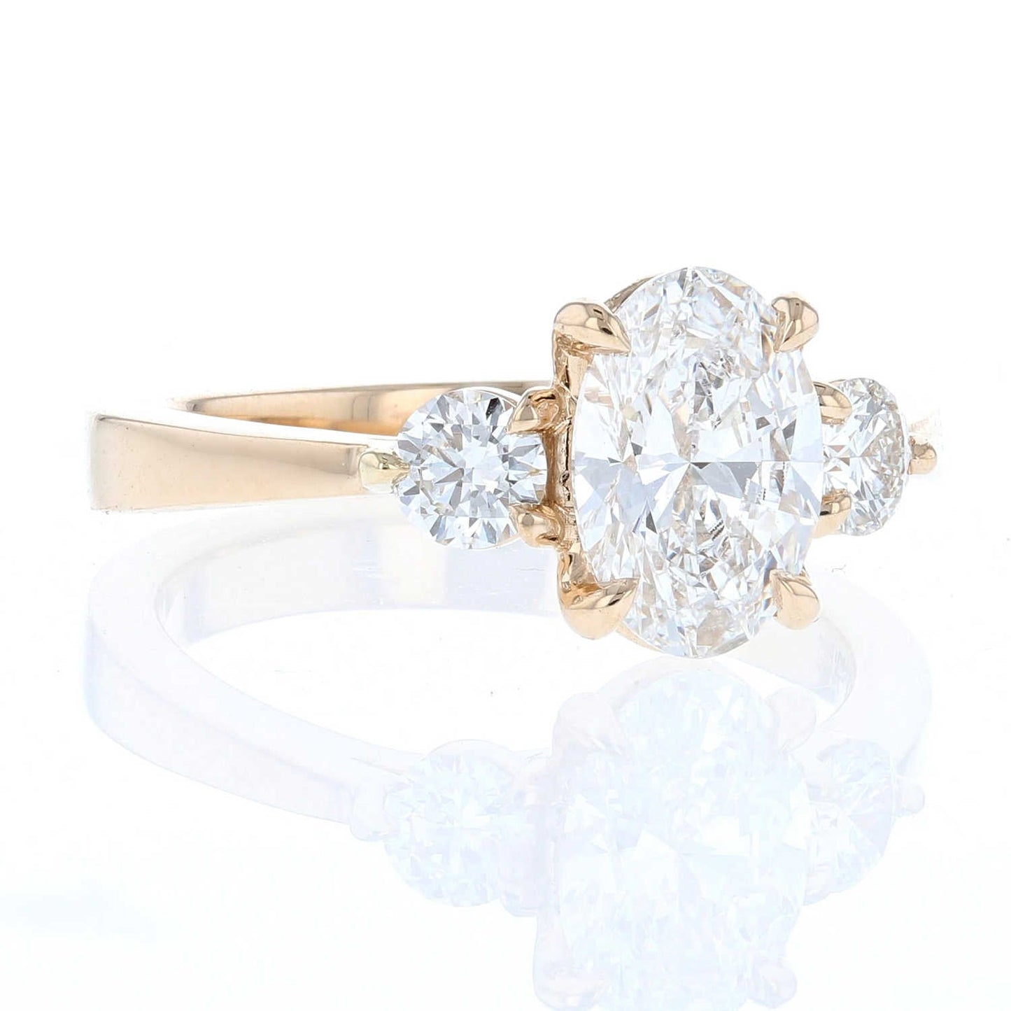 Yellow Gold Oval Diamond Three Stone Tapered Shank Ring