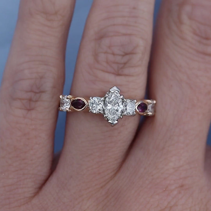 Two Tone Ruby & Marquise Diamond Engagement Ring on a Finger