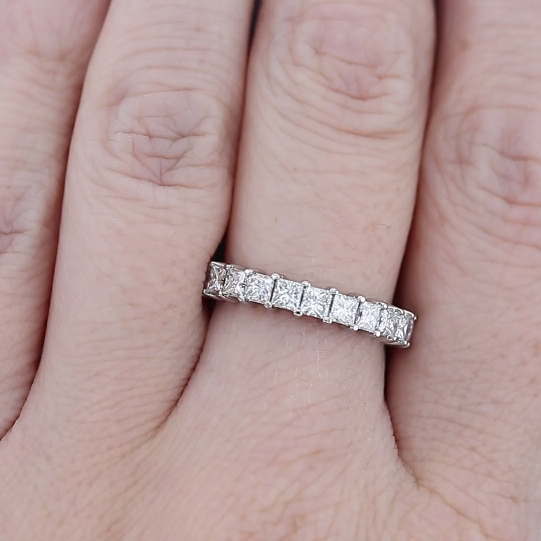 Two Tone Princess Cut Diamond Wedding Band on a Finger