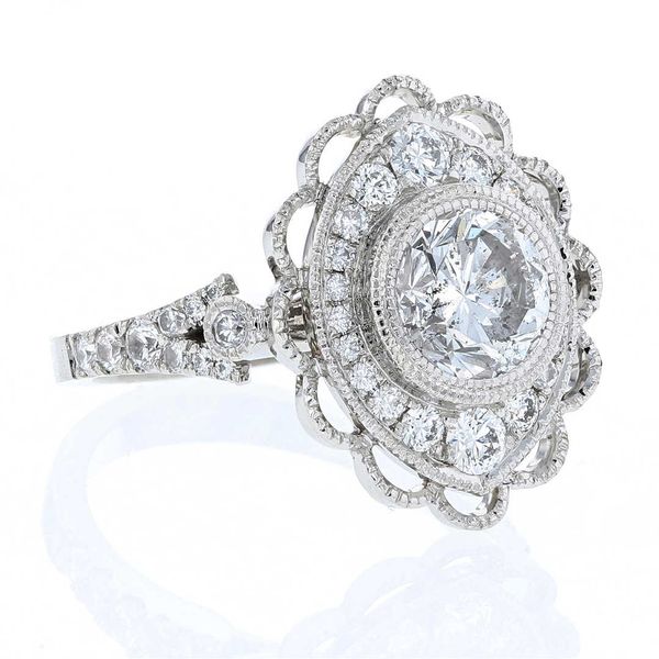 Marquise Shaped Floral Halo Engagement Ring