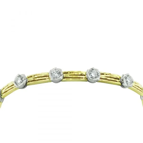 Nature inspired diamond tennis bracelet with hidden clasp