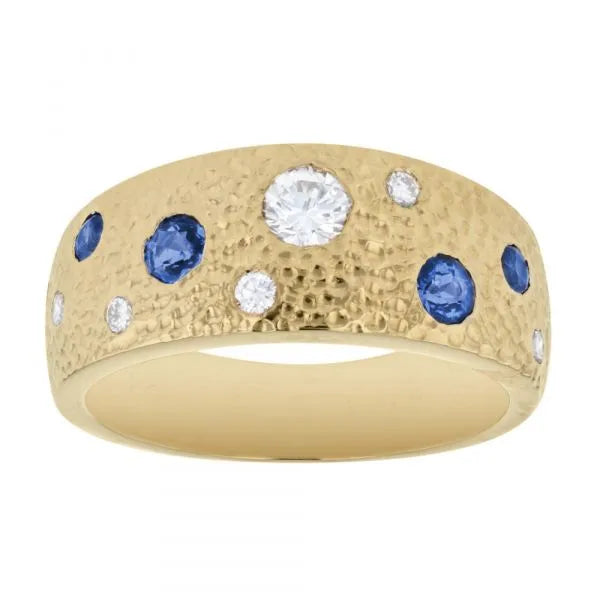 Hammered gold ring with flush set stones
